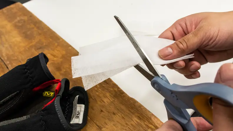Instead of buying an expensive sharpener, try sharpening scissors by cutting a dryer sheet.
