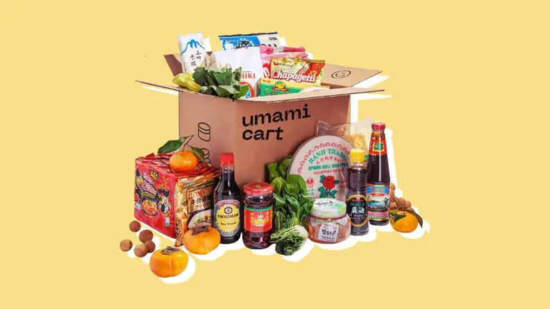 Product shot of assorted Umamicart grocery products inside of box packaging.