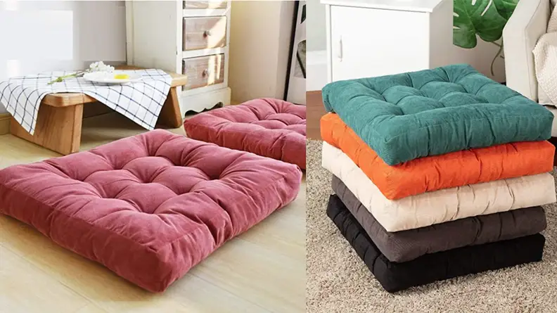A pile of colorful floor cushions.