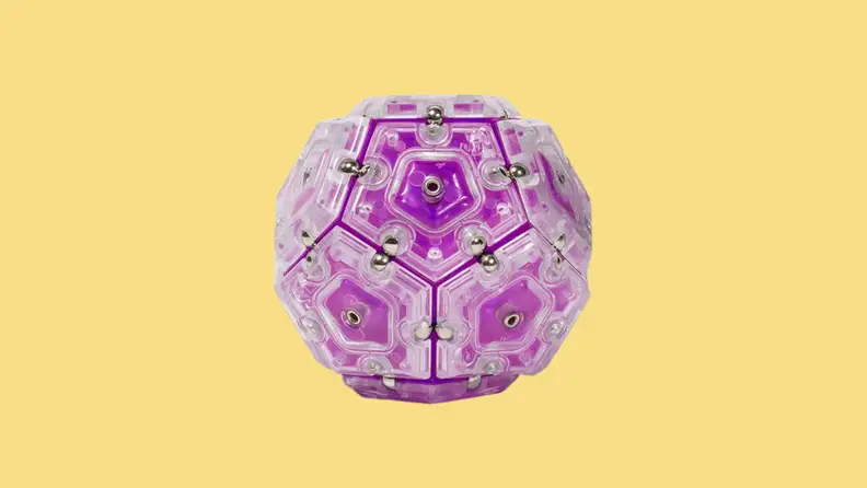 A Speks Geode Magnetic Fidget in the color purple.