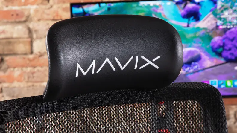 The headrest of the gaming chair.
