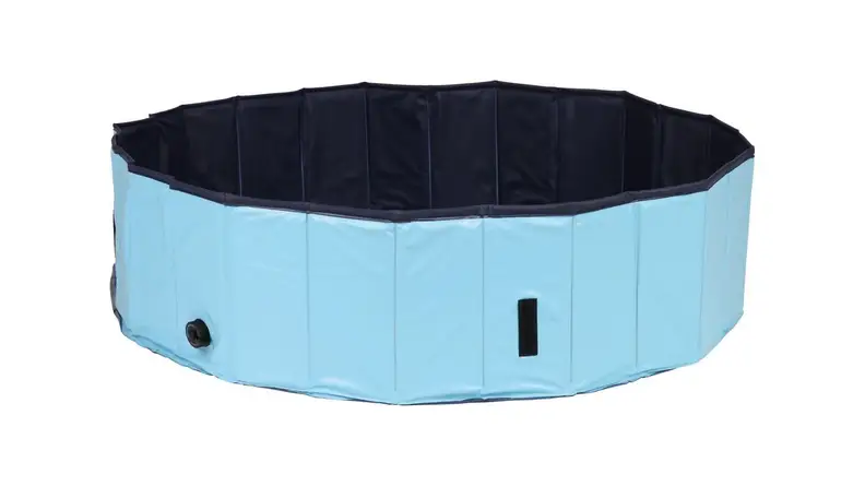 A dog swimming pool with a light blue exterior and dark blue interior is photographed on a white background