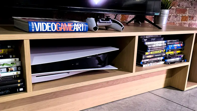 The PS5 in an entertainment center