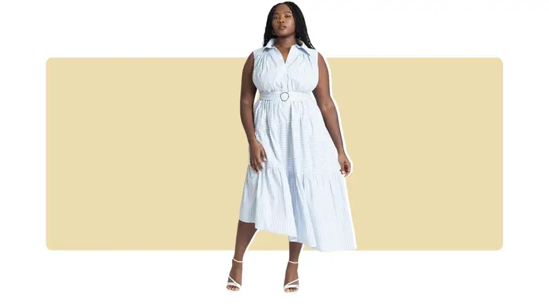 A blue and white striped shirt dress that is belted at the waist and has an asymmetrical ruffled hem.