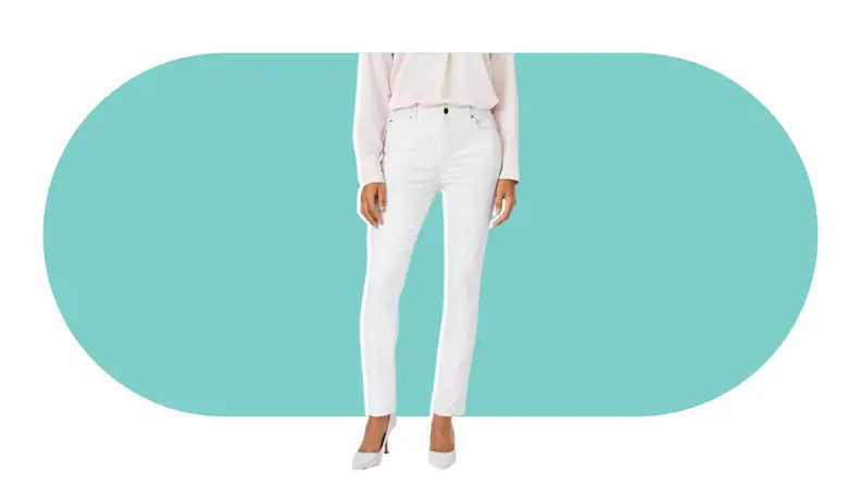 A model wearing the Ann Taylor Sculpting Pocket Mid Rise Skinny Jeans in white.