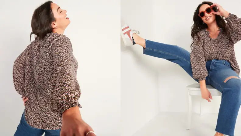A model wears a floral blouse.