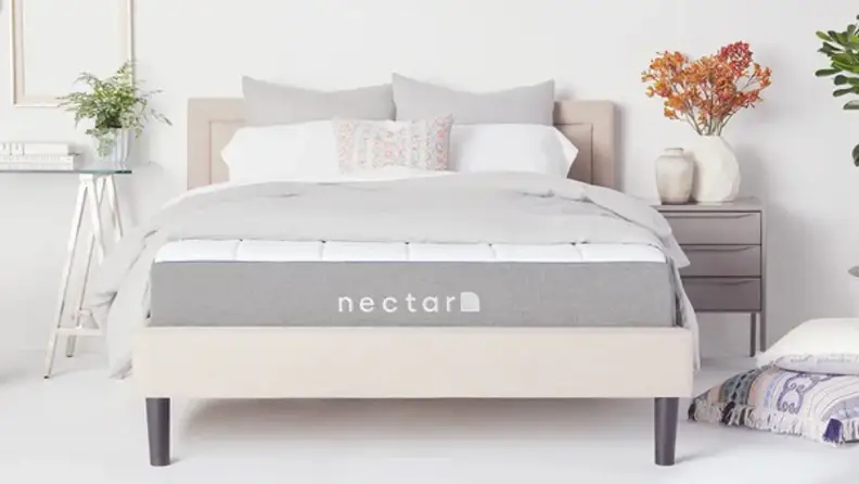 A Nectar mattress on a bed.