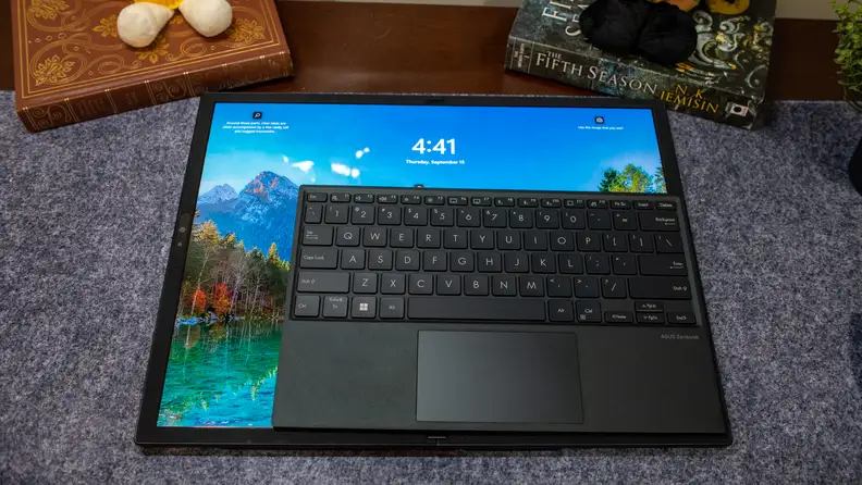 Touchscreen surface of the Zenbook Fold 17 OLED under keyboard.