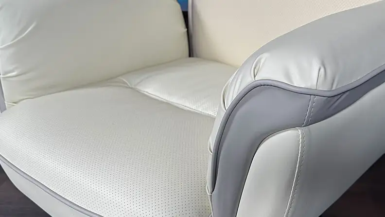 A close-up of the Eureka Royal executive office chair’s upholstery. The leather on the seat is lined with small holes to help it be more breathable.