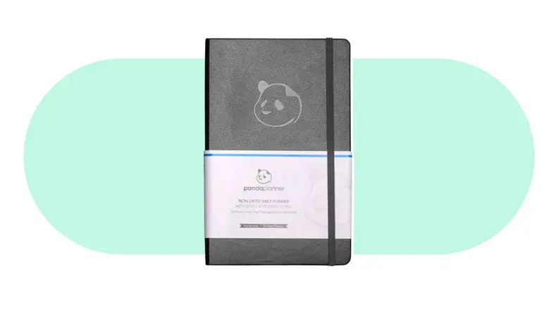A Panda Planner with a gray cloth cover and panda printed on the front.