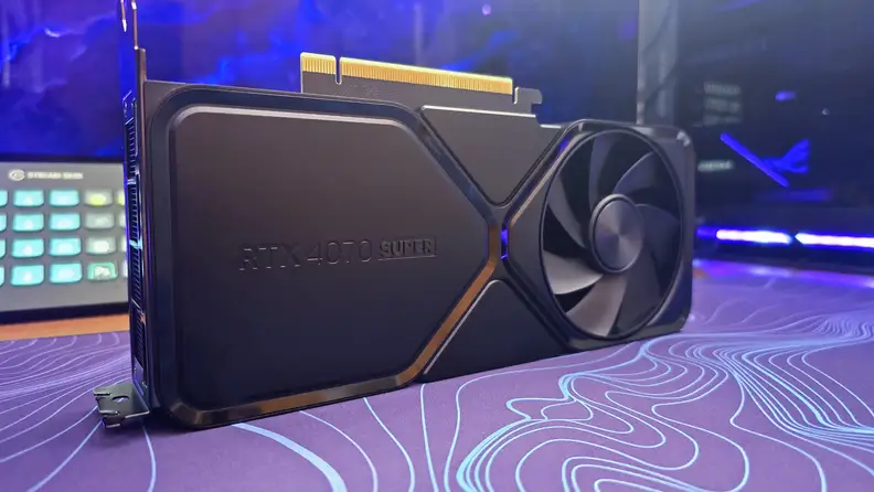 The Nvidia RTX 4070 on a purple and blue mat.