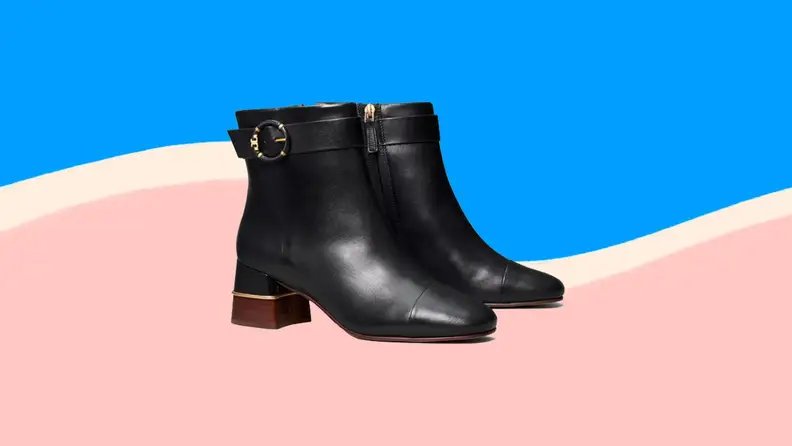 Black shoes on blue and pink background