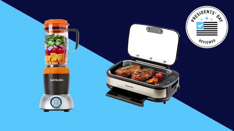Nutribullet blender with fruits and vegetables inside next to grill with steaks.