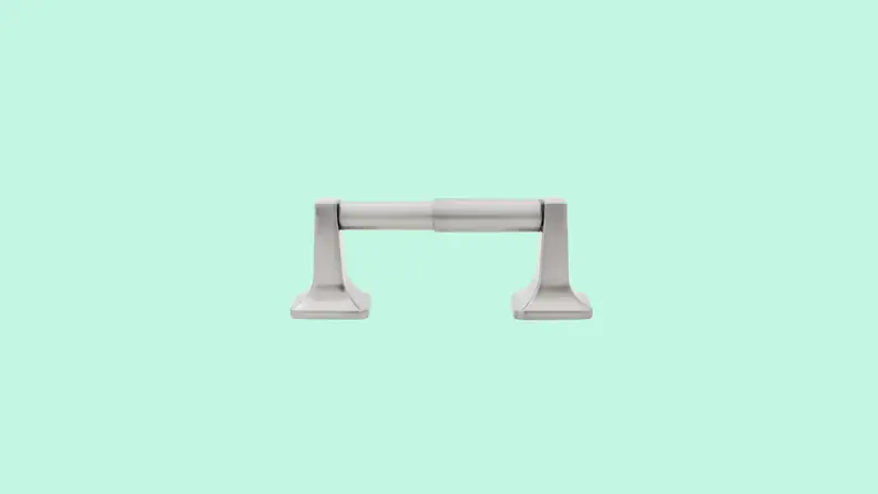 The Project Source Seton Brushed Nickel Wall Mount Spring-loaded Toilet Paper Holder in front of a background.