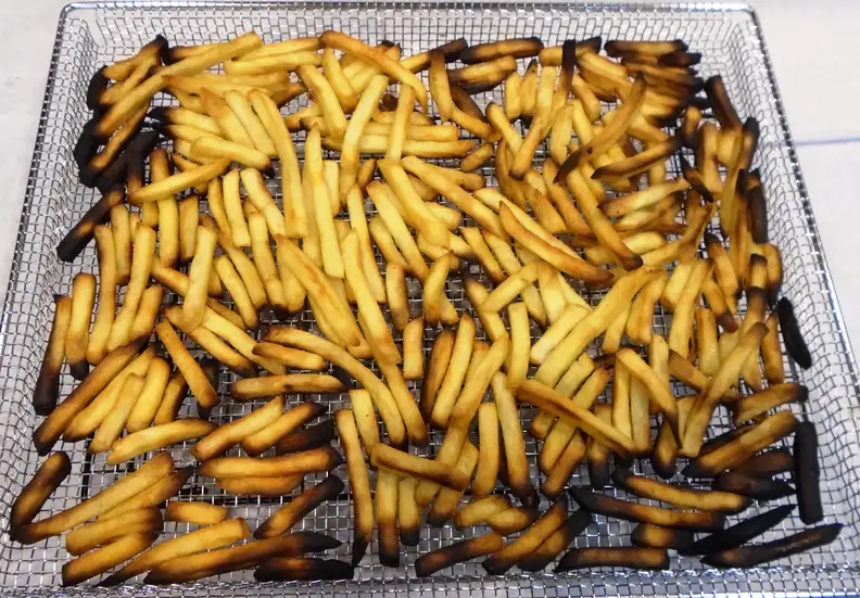 The frozen fries cooked in Air Fry mode were cooked all the way through, and were not oily at all.