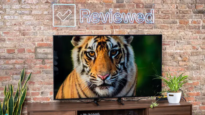 The Samsung Q70A displaying 4K/HDR content in a living room setting