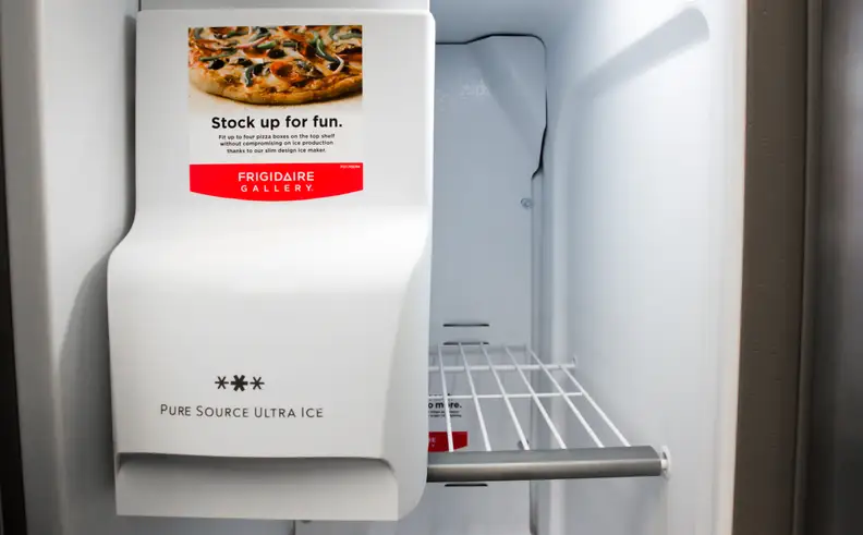 Next to the icemaker, a spot for frozen pizzas