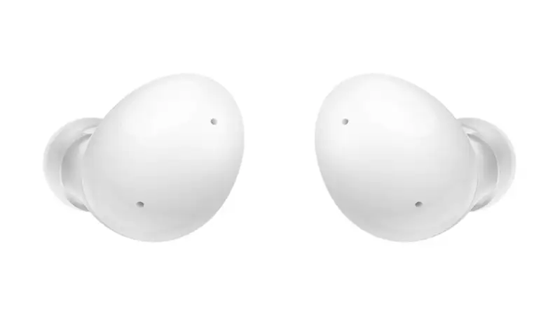 Pair of white cordless earphones in front of white background.