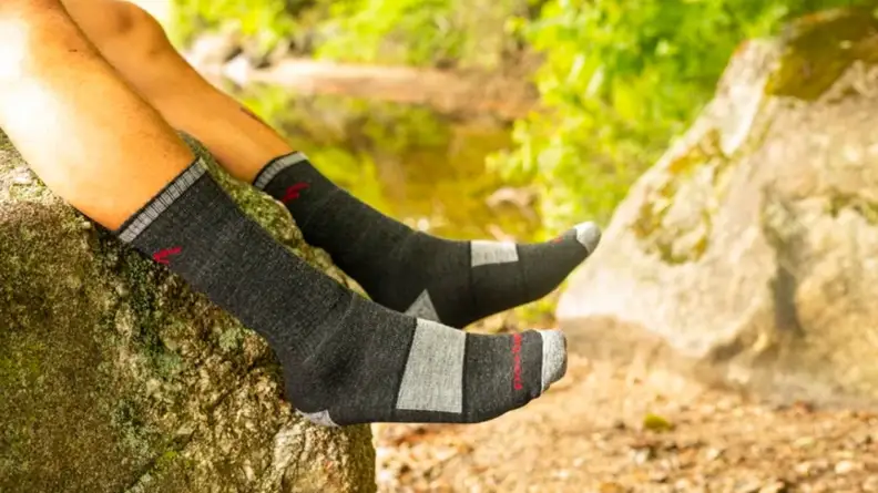 Man wearing pair of Darn Tough Vermont socks.