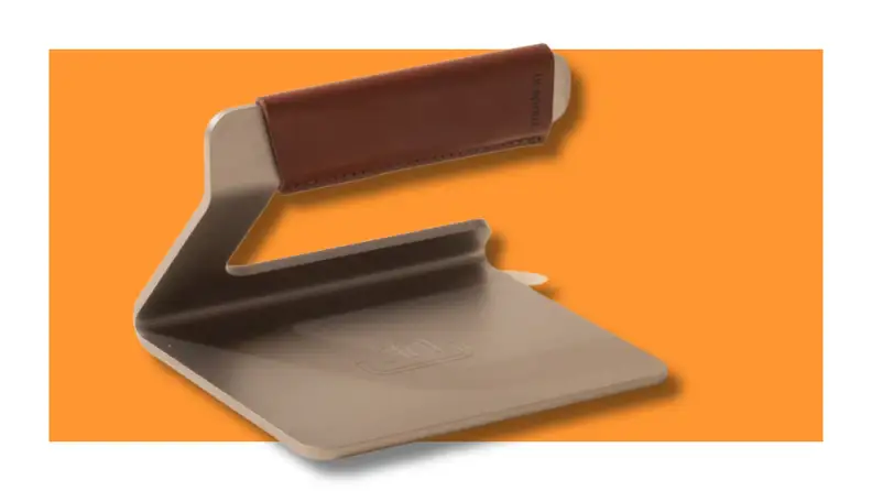 Made In burger press on an orange background