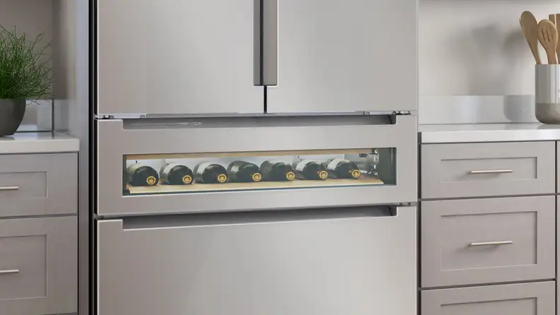 A close-up of the Bosch 800 Series's beverage drawer, with red oak inlay.