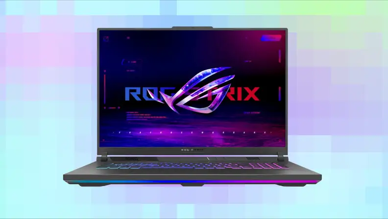 A gaming laptop on a pixelated background