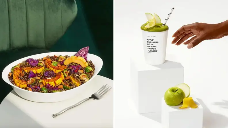 On left, a Daily Harvest Harvest Bake meal, with wild rice, squash, and other veggies. On right, a hand reaching to grab a Daily Harvest Cucumber + Greens smoothie