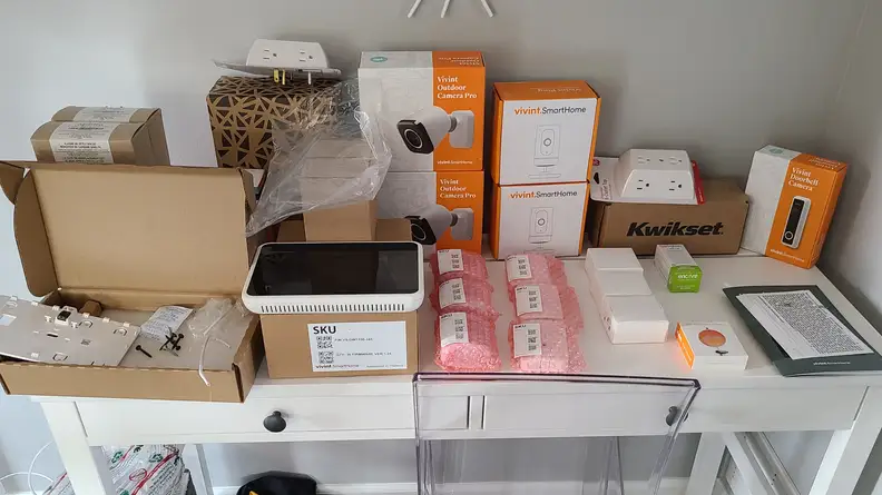 Vivint security product boxes on table