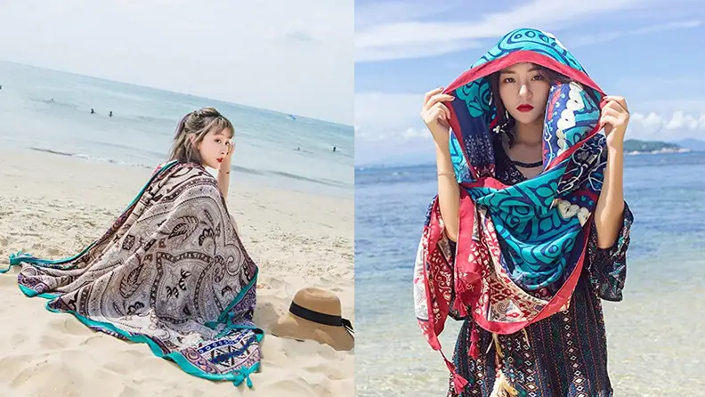 Women wrapped in Sunbaby towel.