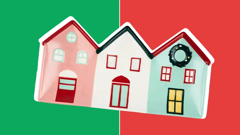 Cookie tray in the shape of three conjoined homes in front of red and green collage.
