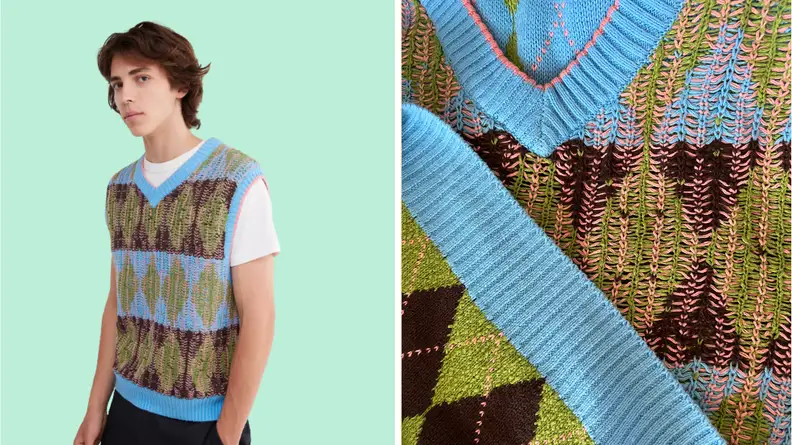 A man in a sweater vest.