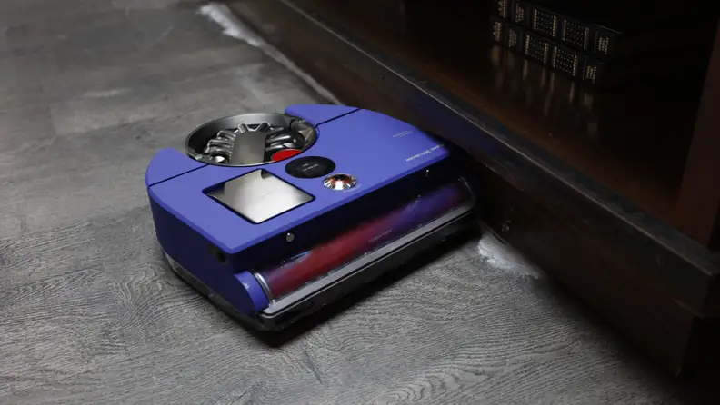 The Dyson 360 Vis Nav robotic vacuum on display at a New York announcement event from Dyson