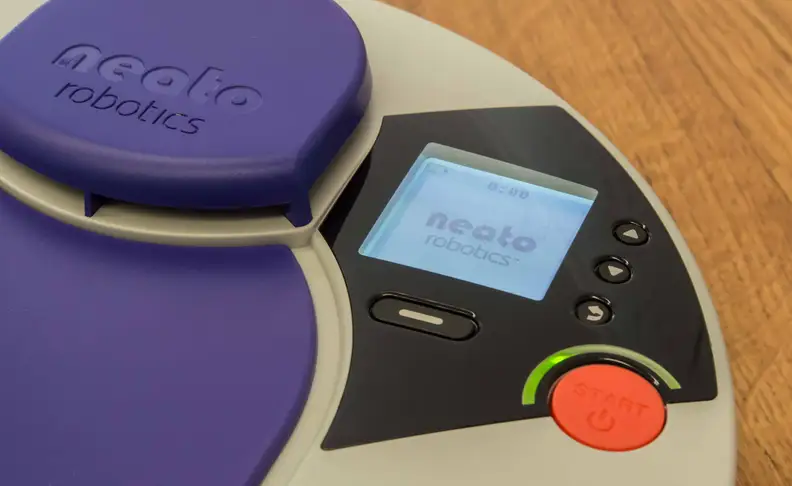 The Neato has a little LCD screen to let you scroll through menu options.