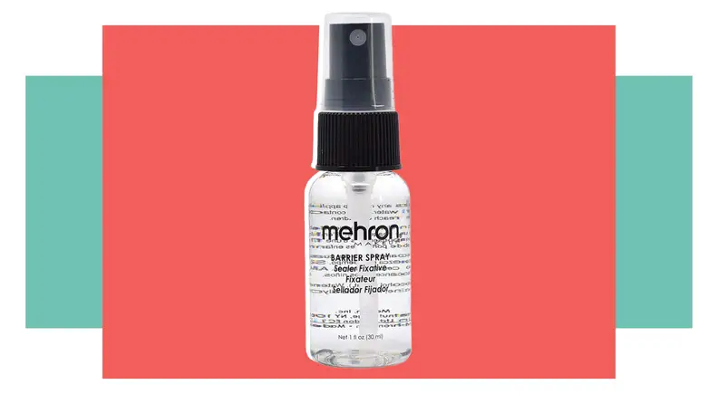 A black and clear bottle of paint setting spray.