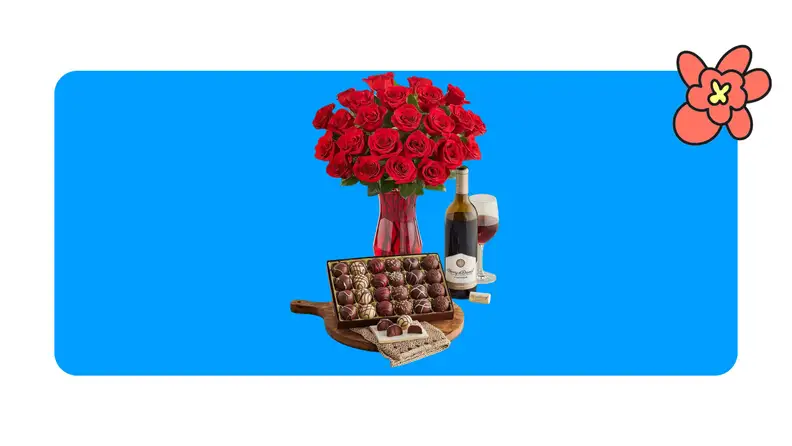 Vase of red roses, chocolates and a bottle of wine and a glass of red wine on a blue background