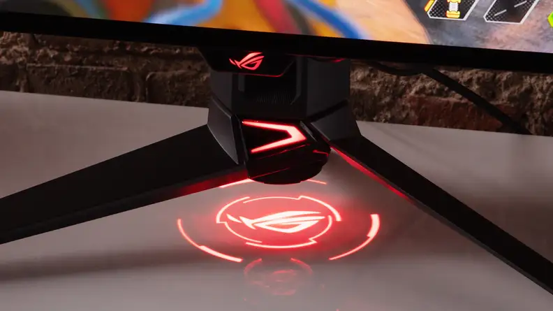 Red light display on the bottom of the Asus ROG Swift OLED PG27AQDMV desktop monitor.