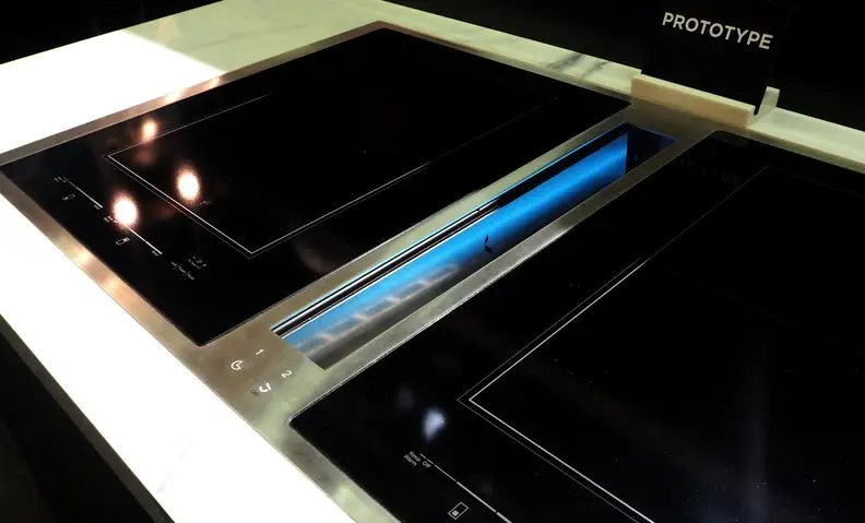 Jenn-Air induction cooktop with downdraft ventilation prototype on