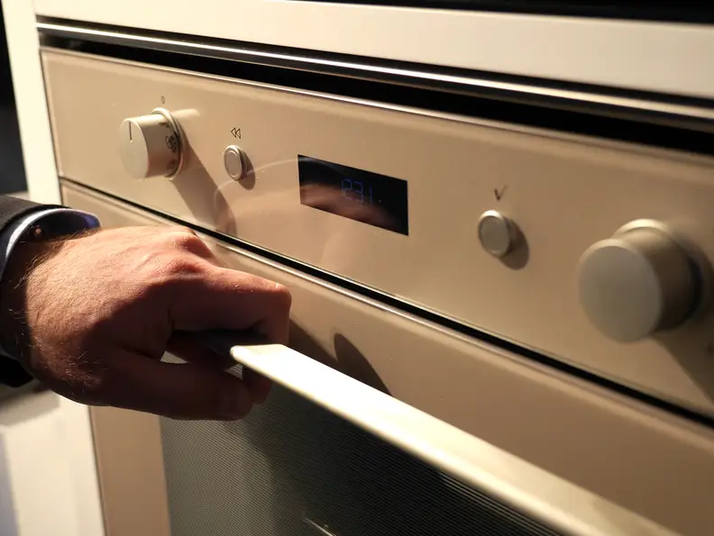 Silver Dawn combines stainless trim with a golden metallic glass front.