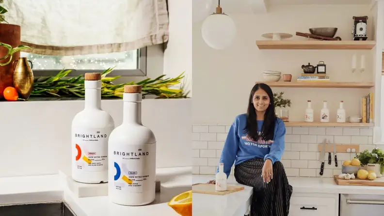 On left, two bottles of Brightland olive oil on white countertop. On right, Brightland Founder Aishwarya Iyer sitting on a white counter surrounded by Brightland products