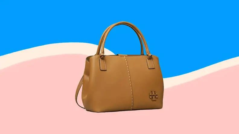 Brown leather bag on blue and pink background