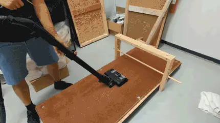 The Shark Vertex going under a wooden bar
