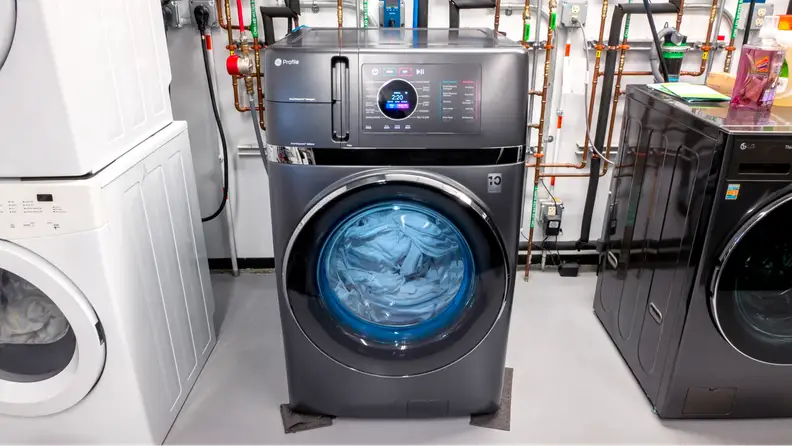 The GE PFQ97HSPVDS washer/dryer combo unit set up in our laundry testing lab.