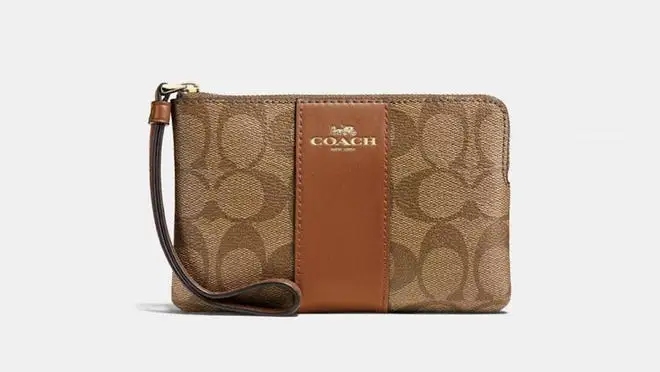 A coach corner-zip wristlet