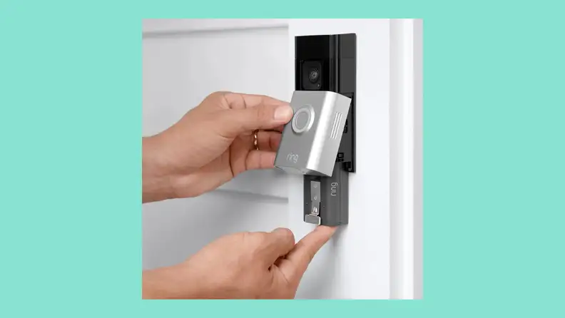 The recharagble battery on the Ring Battery Plus Video Doorbell being removed