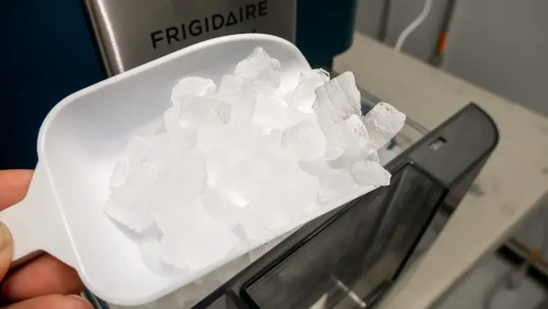 A scoop of nugget ice made by the Frigidaire Gallery EFIC255.