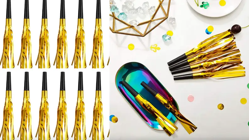 Gold metallic streamer noise makers next to party items.