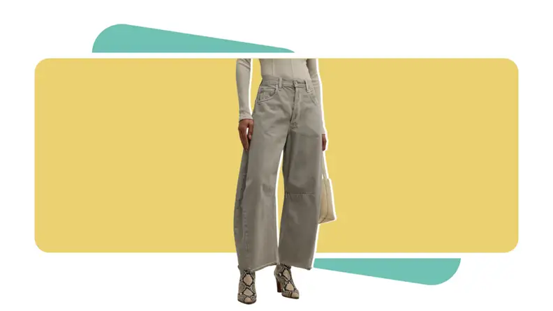 A model wearing gray jeans.