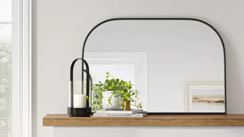 Japandi-style mirror on a mantle