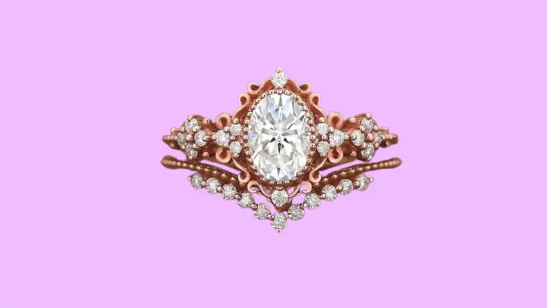 Photo of the Vintage Oval Moissanite Engagement Ring against a purple background.