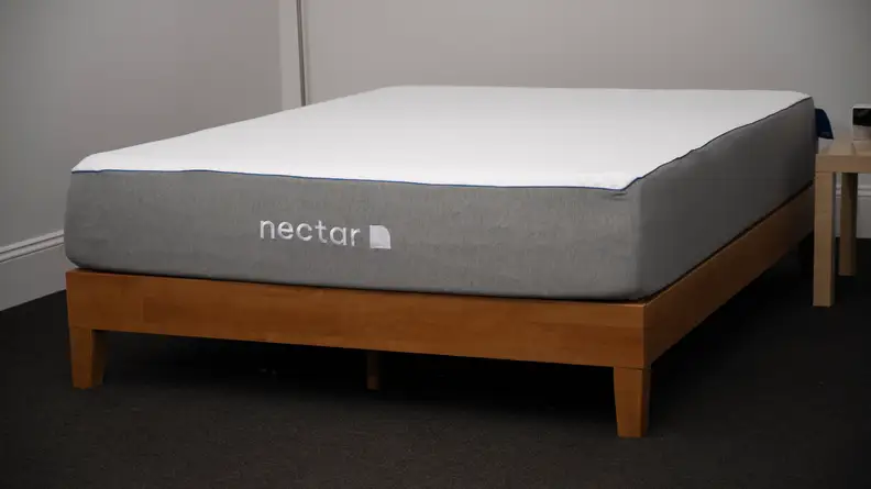 the Nectar Mattress on a brown bed frame